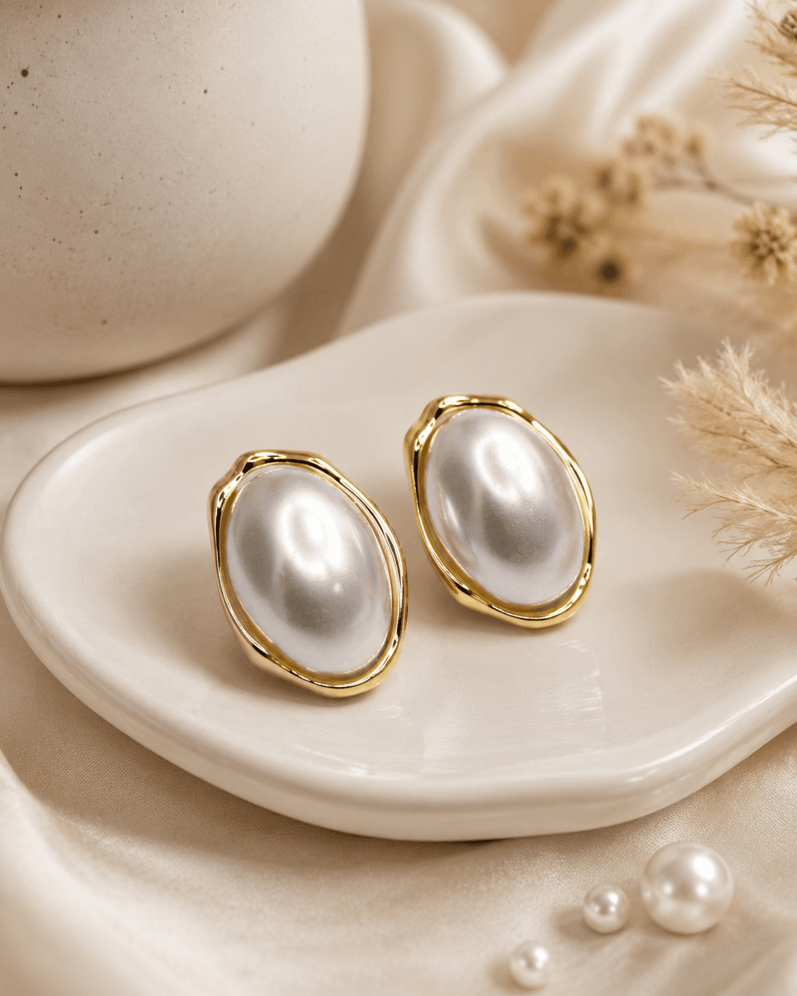 Oversized Oval Pearl Stud Earrings in Gold Frame detail photo 3 - Earrings at ShopKaar