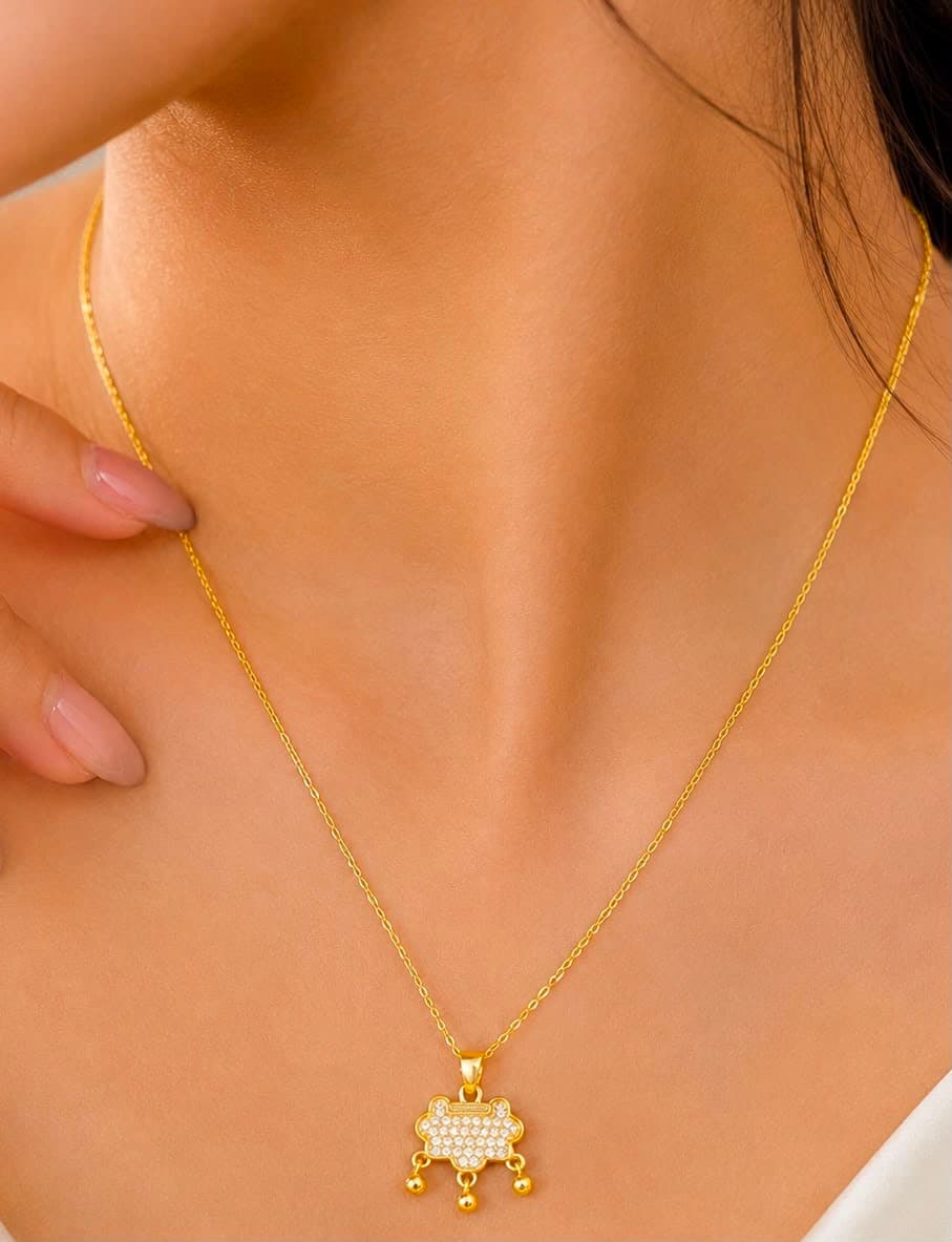 Gold-Tone Dangle Charm Necklace with Clear Accents main product photo - Necklaces at ShopKaar