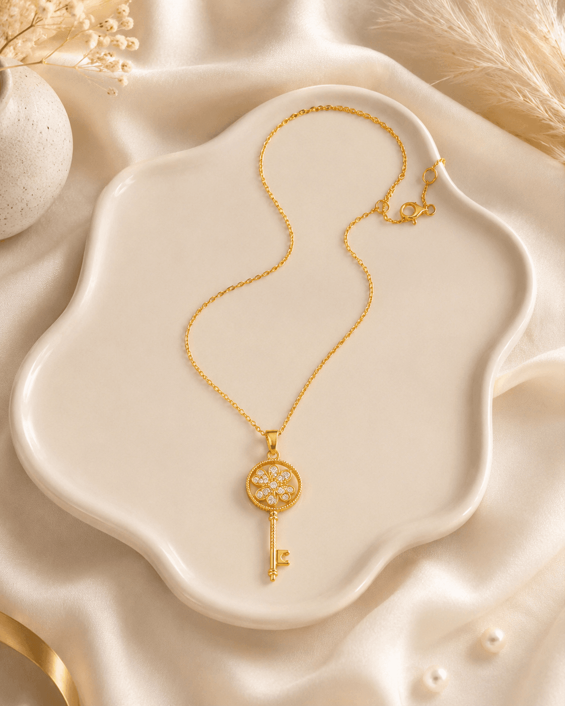 Gold-Tone Clear-Accent Flower Key Pendant Necklace detail photo 2 - Necklaces at ShopKaar