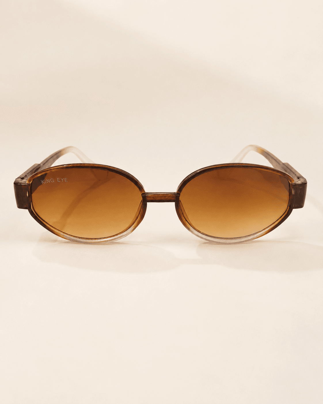 Amber Oval Brown Gradient Fashion Sunglasses detail photo 2 at ShopKaar