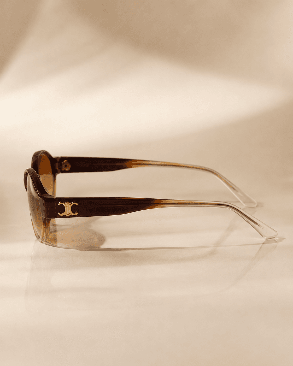 Amber Oval Brown Gradient Fashion Sunglasses detail photo 3 at ShopKaar
