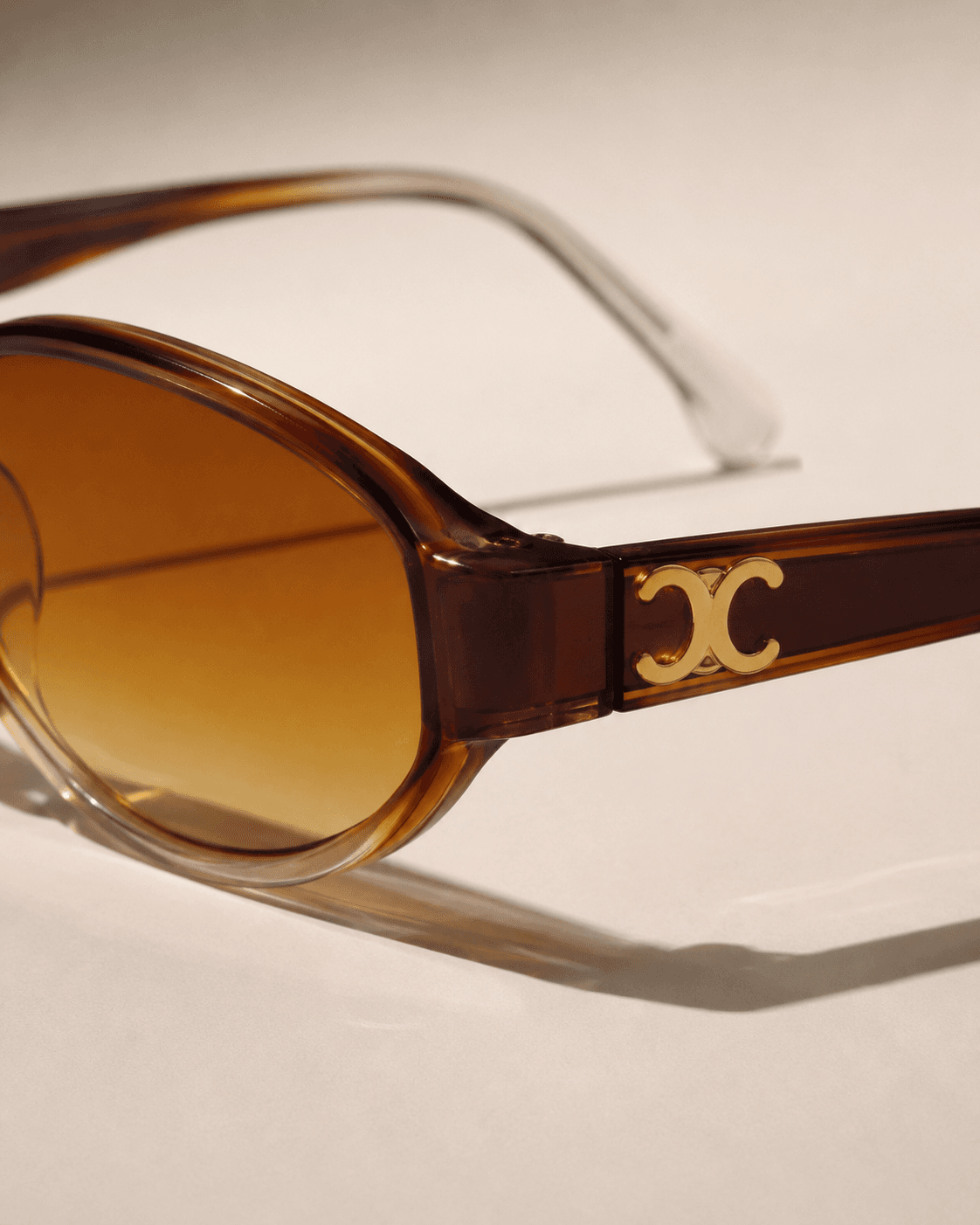 Amber Oval Brown Gradient Fashion Sunglasses detail photo 5 at ShopKaar