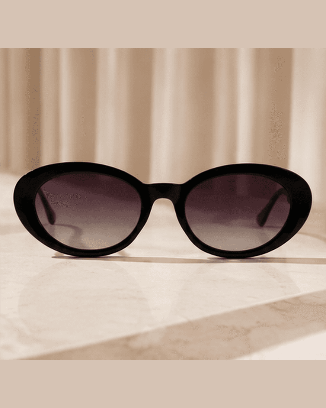 Black Oval Purple Gradient Chain-Temple Sunglasses front view at ShopKaar