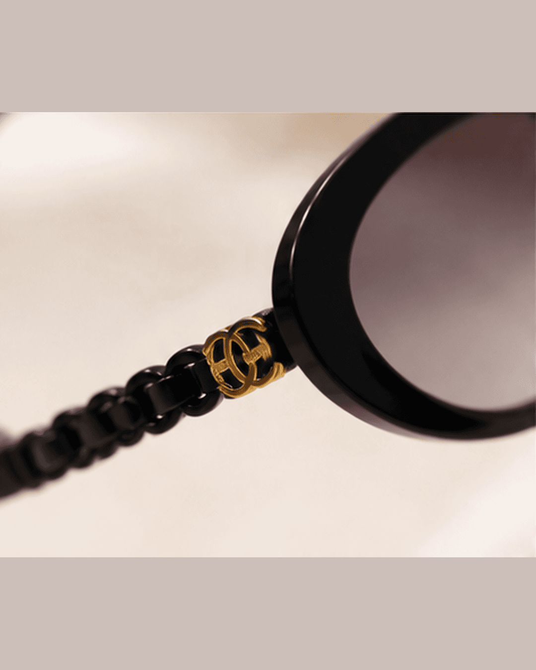 Black Oval Purple Gradient Chain-Temple Sunglasses detail view at ShopKaar